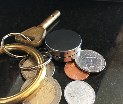 canister-on-keychain-with-coins